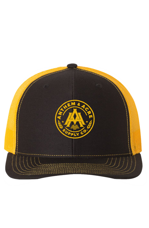 Anthem & Acre Supply Co. Trucker Hat – Black/Gold